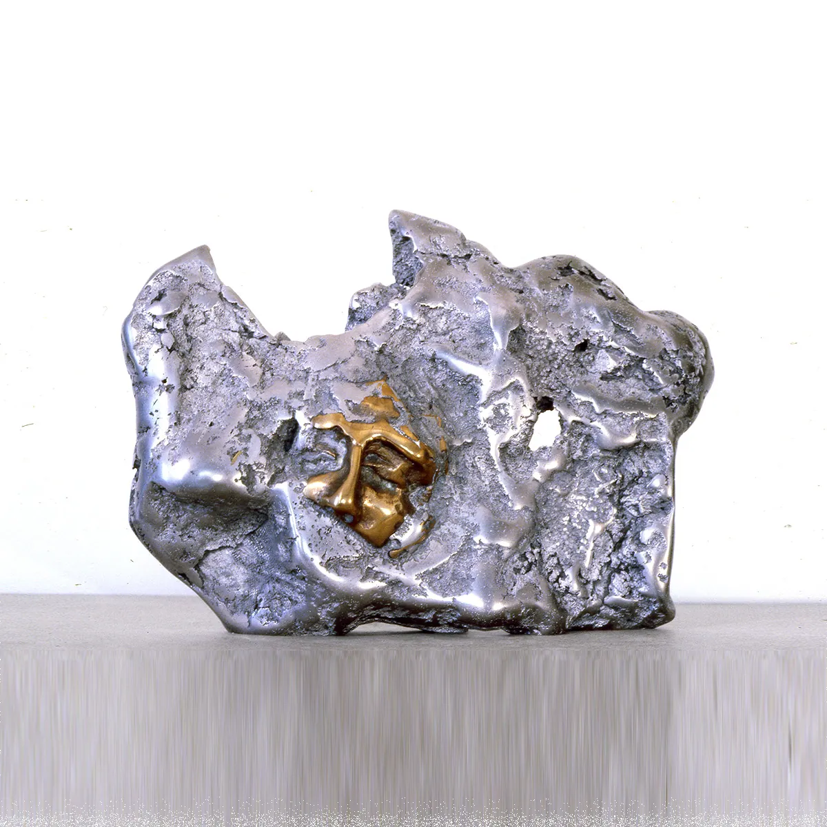 Volcanic Icon | aluminum & bronze | 14 x 20 x 5 inches -Knot- Head- Sand-casted -aluminum - bronze -sculpture- by- Mel -Hantz