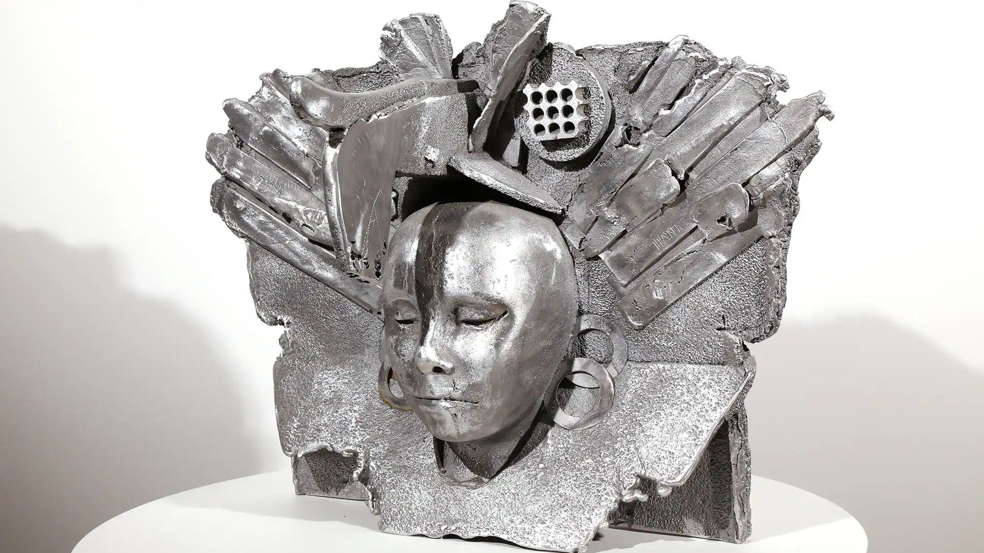 Princess | aluminum | 16 x 21 9 1/2 inches Knot, Head, Sand-casted aluminum sculpture by Mel Hantz