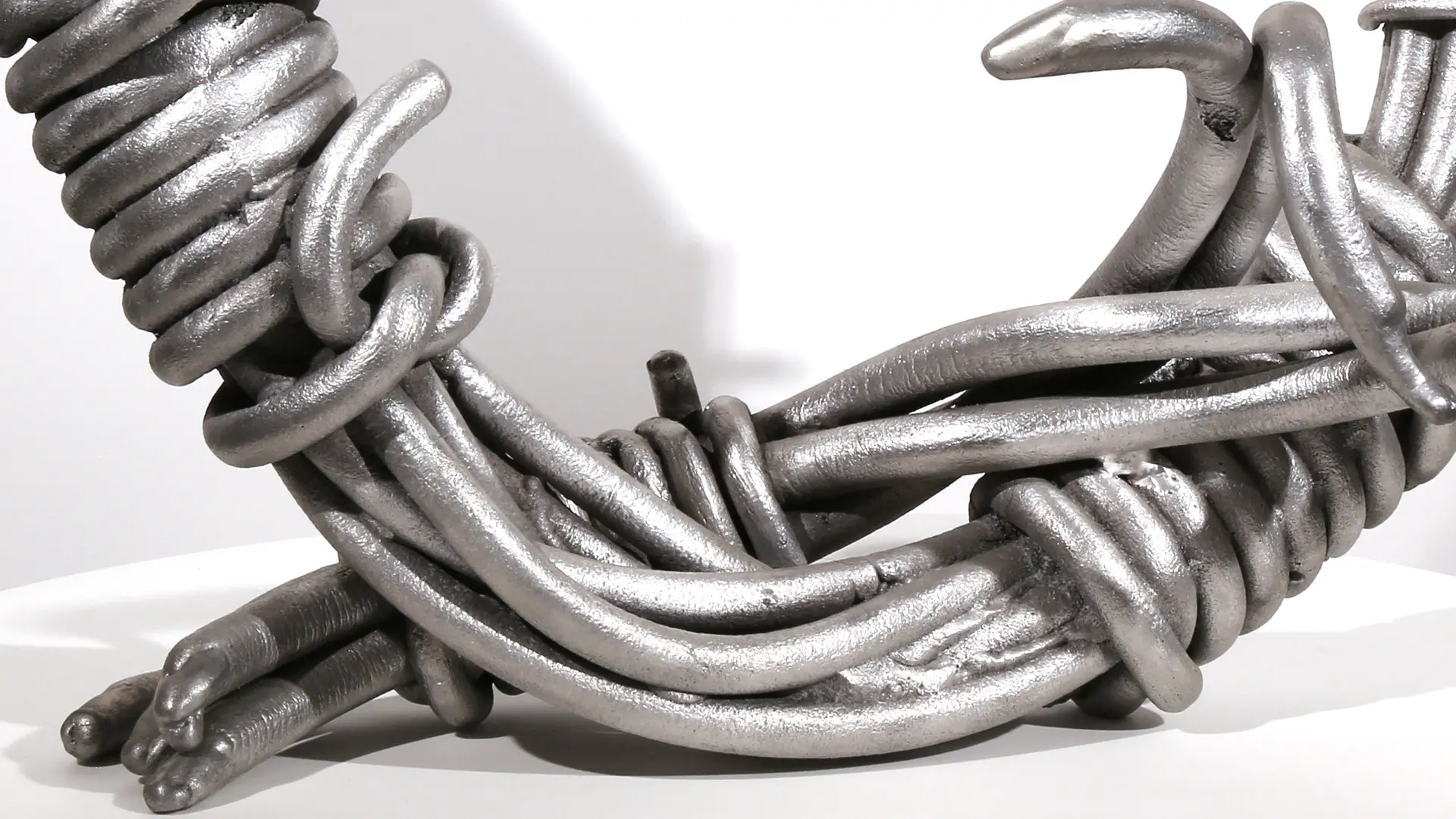 Closure III | aluminum | 18 x 19 x 10 inches Knot, Pure Knots, Sand-casted aluminum sculpture by Mel Hantz